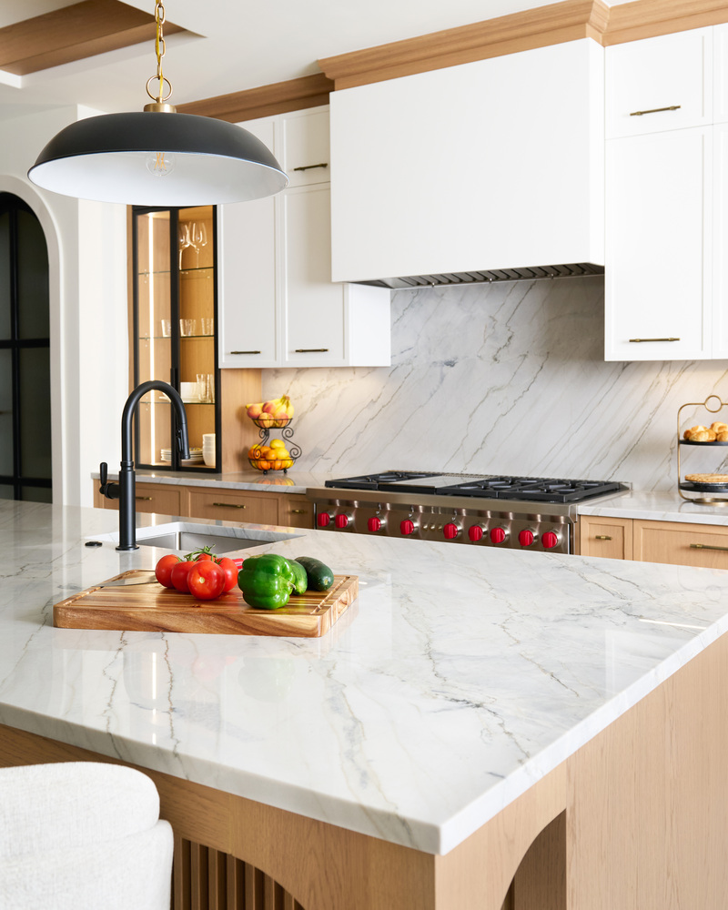 Marble kitchen island with prep station in a Great Falls, VA custom kitchen by DesignLab