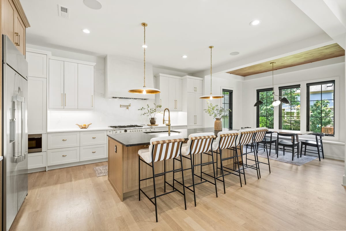 Custom kitchen remodel with oversized island and pendant lights by DesignLab in Washington, DC