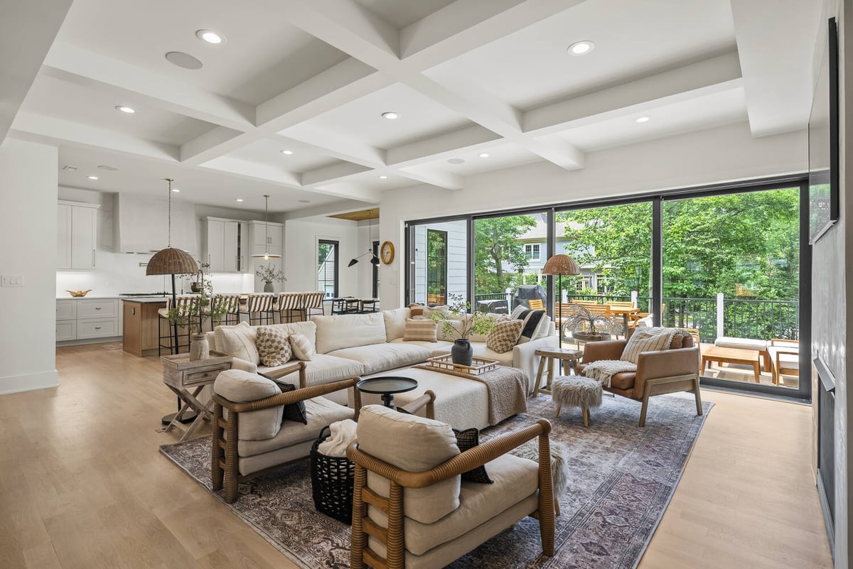 Open concept living and kitchen area in Washington, DC home by DesignLab