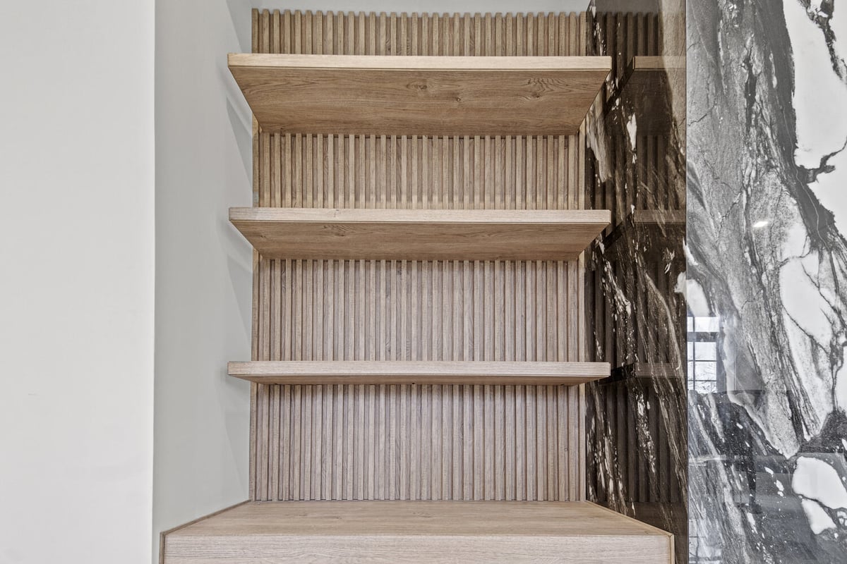 Custom wood millwork shelving detail in a Northern Virginia whole home remodel by designlab