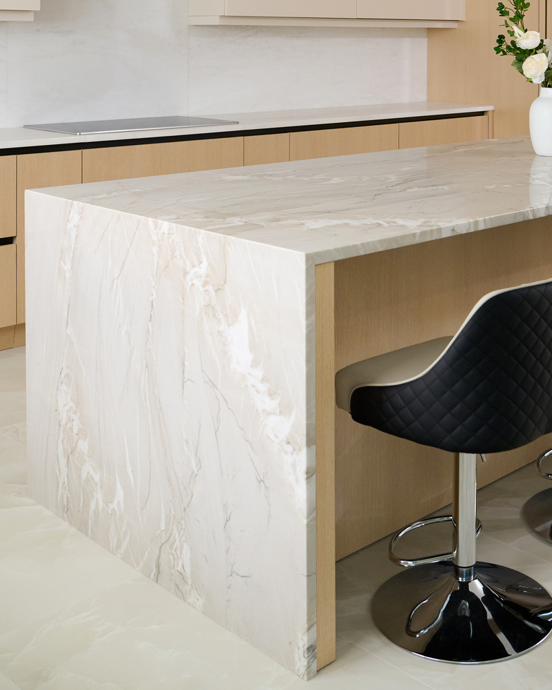 Marble waterfall island detail in luxury kitchen by DesignLab in Metro Washington