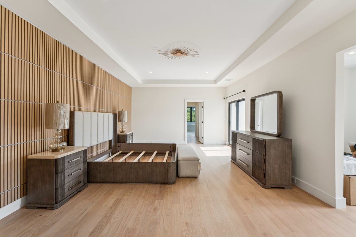 Spacious master suite remodel with unique wood paneling by DesignLab in McLean