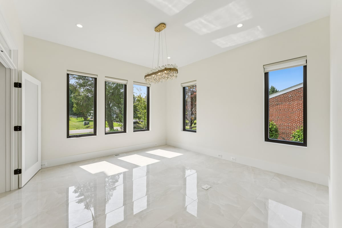 Sunlit modern interior room remodel with marble floors by DesignLab in Bethesda