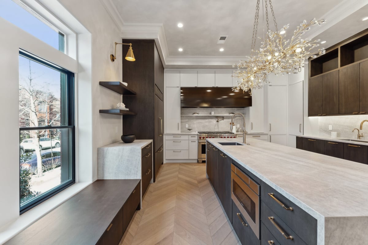 Designer kitchen with mix of dark and white cabinetry by DesignLab in Metro Washington