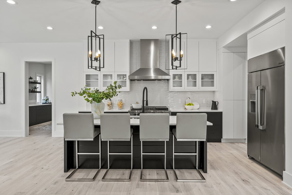 Contemporary kitchen with island seating and stainless appliances by DesignLab in Arlington, VA